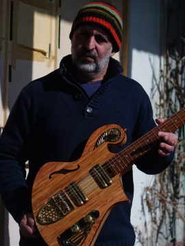 The Ancient Salvaged Olive Thunder Child Veloce Guitar