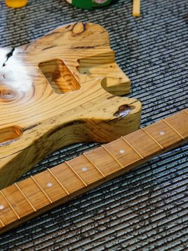 The “Battle-Scar” Reclaimed Pine Sonic Wonder Guitar